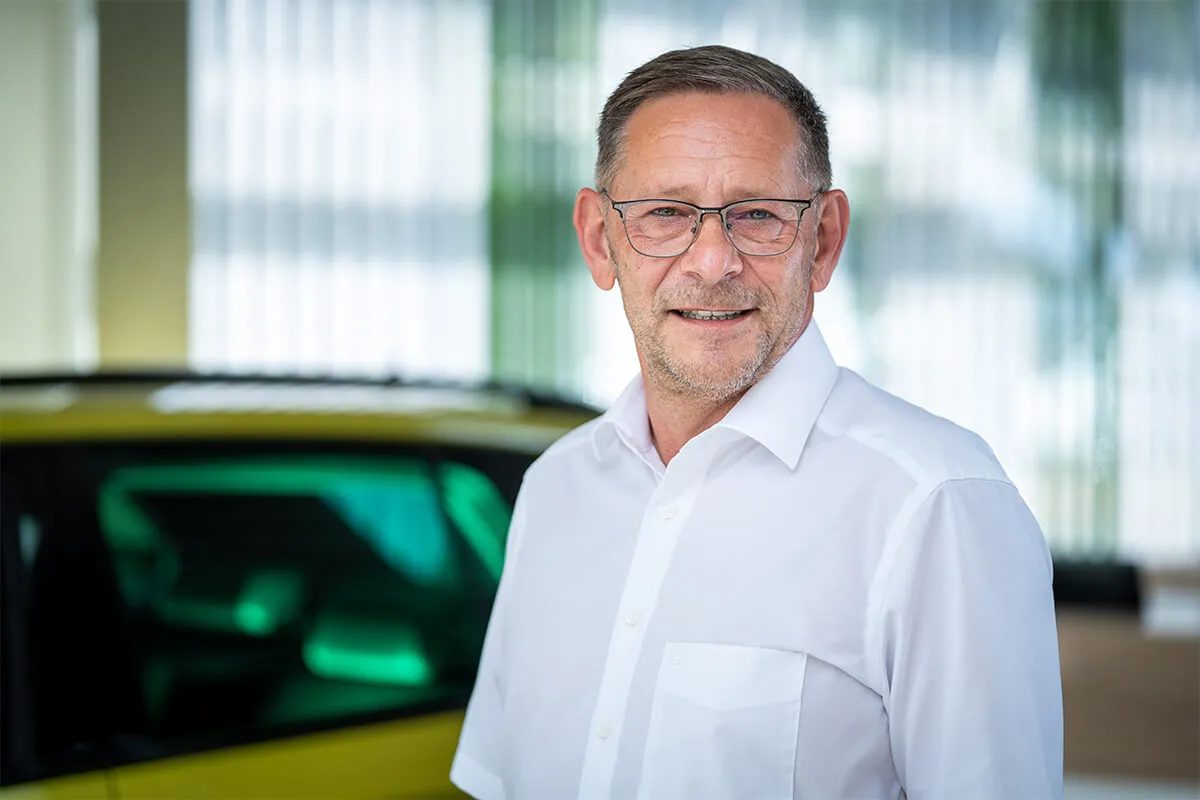 Porträt des Geschäftsführers im Autohaus Zeidler